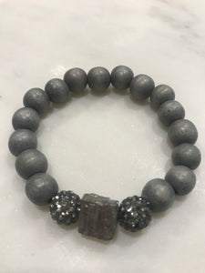 Pyrite center chunk with side pave beads