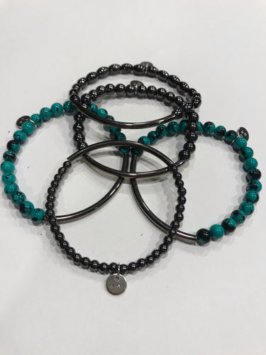 Five piece hematite and reconstituted turquoise with gunmetal bars