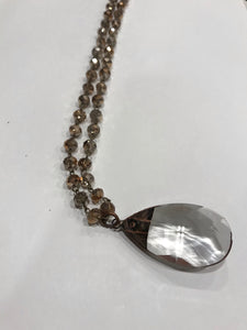 Copper teardrop pendant on copper crystal chain