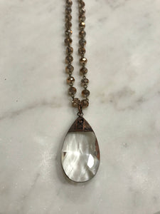 Copper teardrop pendant on copper crystal chain